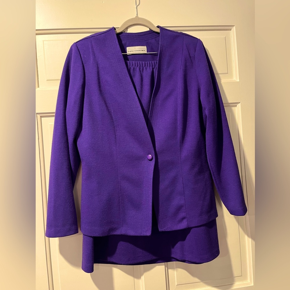 Sz 16 , long sleeve purple suit. Worn once.